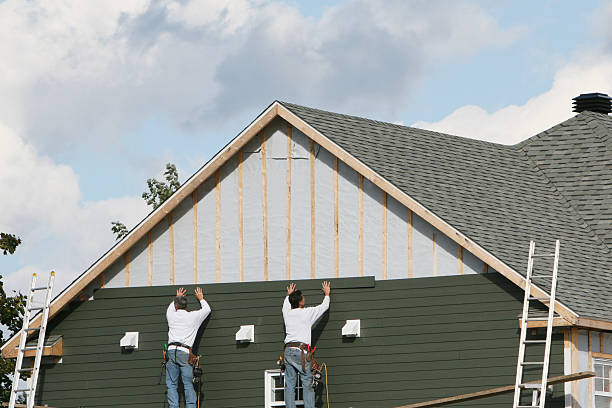 Professional Siding Repair technician working in Jamestown, OH